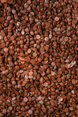 chocolate drops (sweets). food background. copy space. top