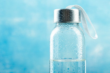 Small glass water bottle
