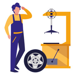 mechanic worker with tire changer machine