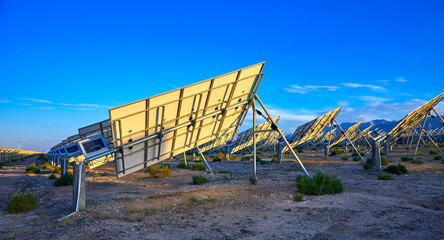 Beveled solar photovoltaic panel back under the setting sun