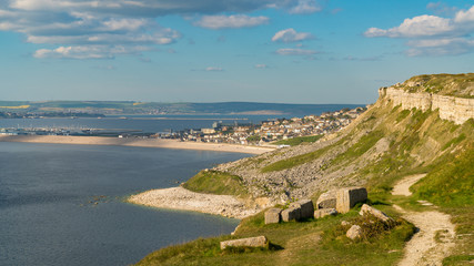 South West Coast Path on the Isle of Portland, looking towards Fortuneswell and Chesil Beach with...