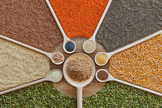Various grains and cerelas on the table in a colorful arrangement