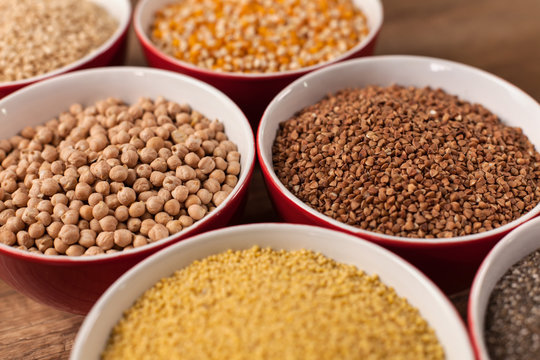 Various seeds and grains in bowls - close up