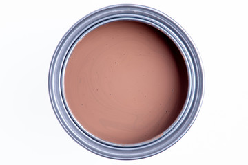 Can with brown paint isolated on white background, top view
