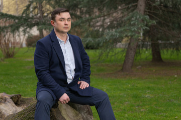 Obraz premium Portrait of a man resting in the park