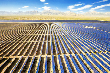 Aerial photography of a large solar photovoltaic power station in the desert