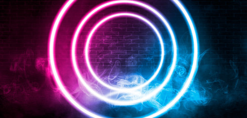 Background of empty stage, room. Reflection on wet pavement, concrete. Neon blurry lights. Neon circle figure in the center, smoke