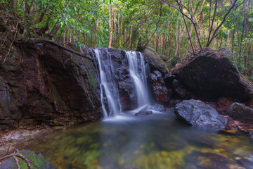 Waterfall in tropical forest.