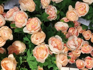 Beautiful artificial pink roses on the market