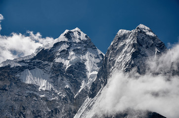 huge Himalayan mountain  amadablam with a glaciers in Nepal
