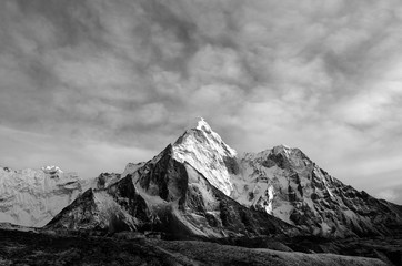huge Himalayan mountain  amadablam with a glaciers in Nepal