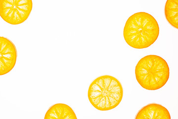 Sweet candied orange slice isolated on a white background. Flat lay, top view. Fruit composition