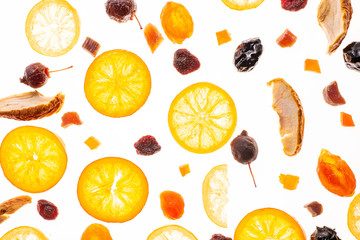 Sweet candied fruit isolated on a white background. Flat lay, top view. Fruit composition
