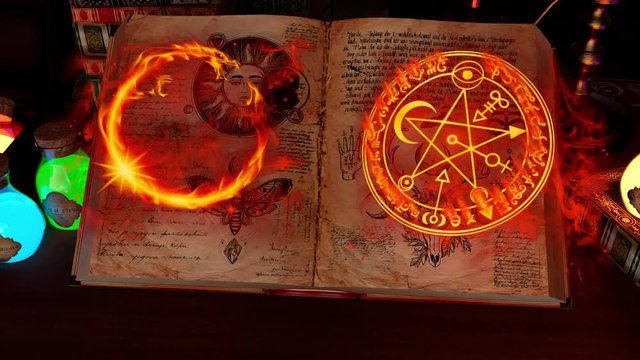 mystic room or alchemist`s study room with candles, books, bottles and alchemical symbols, with zoom in on the boook