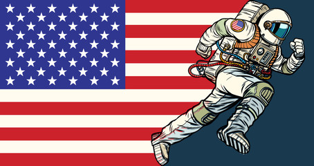 American astronaut patriot runs forward. USA flag © studiostoks