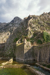 Fototapeta na wymiar Ancient fortifications. Montenegro. Old Town of Kotor - UNESCO World Heritage site. View of Northern walls and Riva Bastion