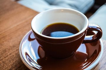 Obraz premium Alternative way of preparation of coffee. The invigorating morning strong drink in the server and a cup. Coffee shop. 