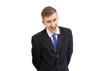 Portrait of funny young attractive business man in a dark suit and a bright blue tie, isolated on white