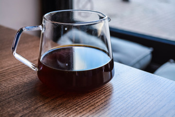 Alternative way of preparation of coffee. The invigorating morning strong drink in the server. Coffee pot.
