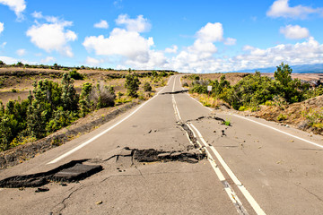 The Damaged asphalt road Crater Rim Drive in the Hawaii Volcanoes National Park after earthquake...