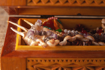 Treasure in a wooden open chest. A Pirate treasure.