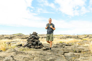 Man at the Hawaii Volcano National Park, Pu u Loa petroglyphs, amazing walk into the past.