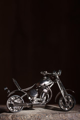Fototapeta na wymiar Handmade miniature of a motorcycle