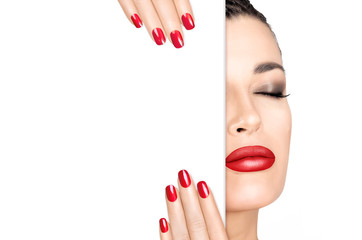 Beauty Makeup Concept. Red Nail Art and Make-up. Half face with a white card template.