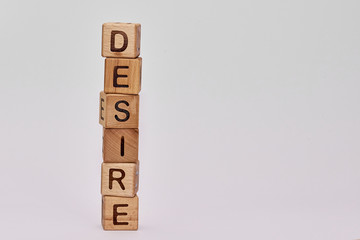 wooden cubes on a white background and various chaotic letters