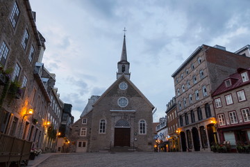 Beautiful 1688 patrimonial Notre-Dame-des-Victoires church and houses on Place Royale in the old...