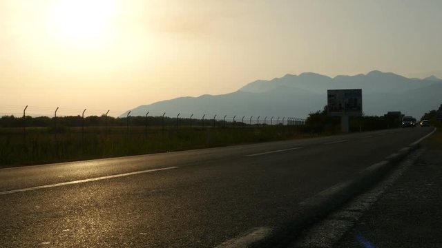Cars traffic on the mountain road. Cars moving on the raod