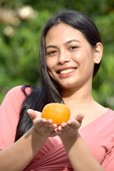 Woman And Happiness With Oranges