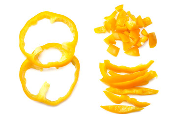 cut slices of yellow sweet bell pepper isolated on white background top view