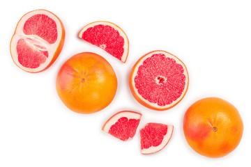 Grapefruit and slices isolated on white background with copy space for your text. Top view. Flat lay pattern