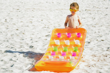 Beach vacation - cool boy on the beach