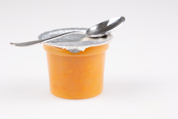 orange peach apricot compote puree or sauce jam with spoon