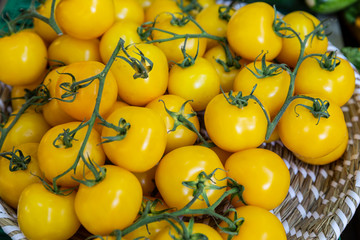 Delicious fresh yellow tomatoes for sale at a market in France