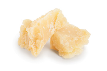 Parmesan cheese pieces isolated on white background. Closeup