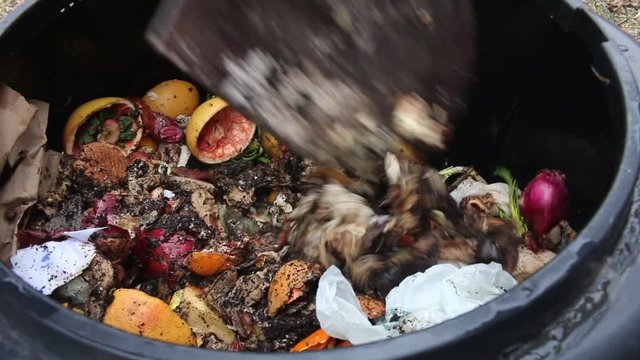 turning compost pile
