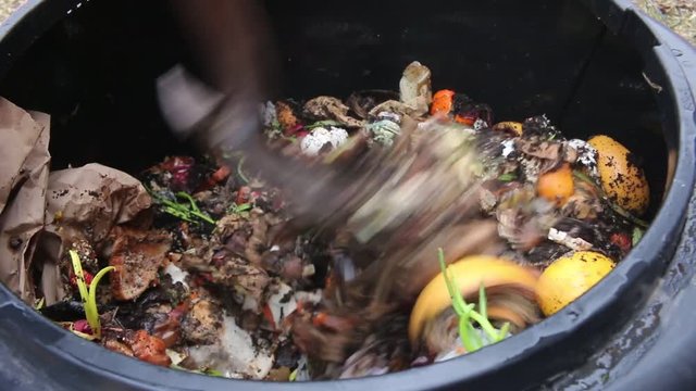 turning compost pile