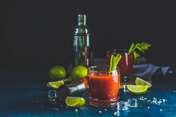 Bloody Mary cocktail in portion drink glasses © Victoria Kondysenko