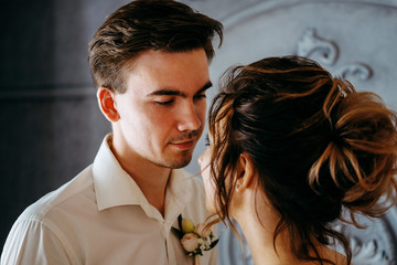 Two young lovers getting ready for the wedding