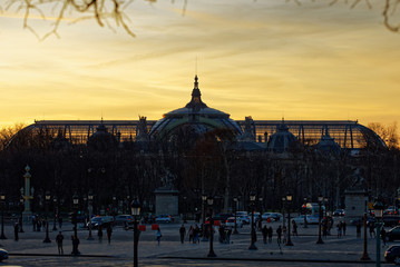 Obraz premium Paris, France - February 13, 2019: Grand Palais dome viewed from Tuileries garden in Paris at golden hour
