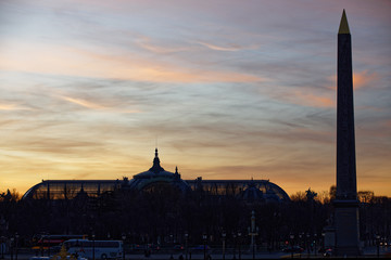 Fototapeta premium Paris, France - February 13, 2019: Grand Palais dome viewed from Tuileries garden in Paris at golden hour