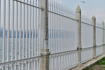 Iron railing near the beautiful Istanbul Strait. iron fence. seaside iron fence