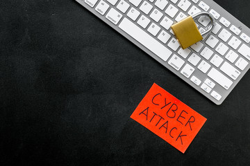 Data breach concept with locker and keyboard on black background top view mockup