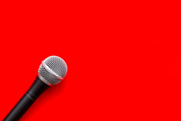 podcast record with microphone on red background top view space for text