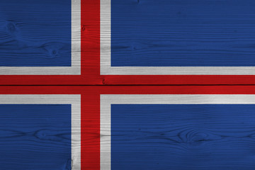 Fototapeta premium Iceland flag painted on old wood plank