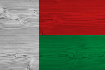 Madagascar flag painted on old wood plank
