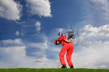 Stuntman igniting a rocket strapped to his back
